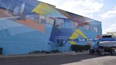 See murals painted live during 2023 Boom! Street Art and Mural Festival in downtown Salina