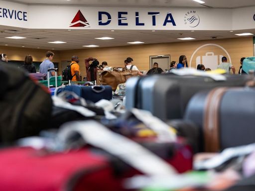 ‘Just shocking’: Delta passengers tell of airport agony and honeymoon travel woes during tech meltdown