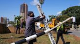 Kenyan authorities clear debris after protests which left at least six dead