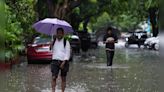 Delhi weather | Heavy rains cause waterlogging and traffic, IMD issues yellow alert - CNBC TV18