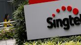 Singtel falls up to 3% after $2.3 bln impairment