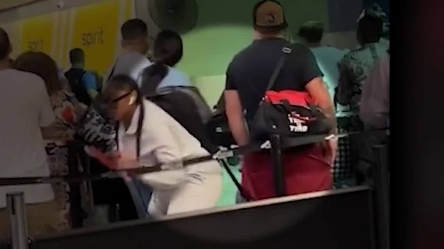 Watch: Man with weapons at Cleveland airport, first charge filed