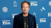 David Duchovny says a director used a megaphone to tell him when to orgasm during his first sex scene in 1991