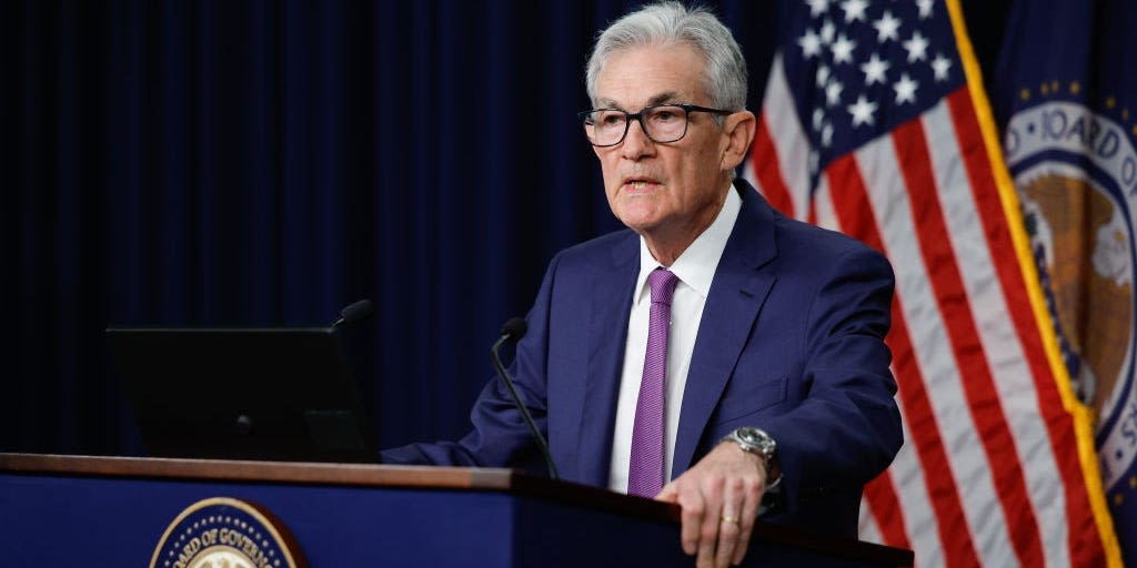 The economy needs to take one of these 2 paths before the Fed cuts interest rates, Powell says