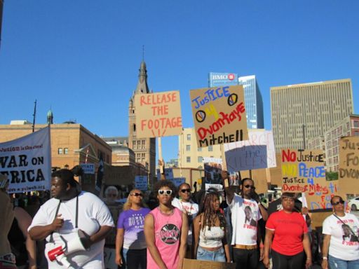 Families of Sam Sharpe and Dvontaye Mitchell rally in Red Arrow Park