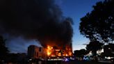 Fire engulfs 2 buildings in Spanish city of Valencia, killing at least 4 people. Nearly 20 missing