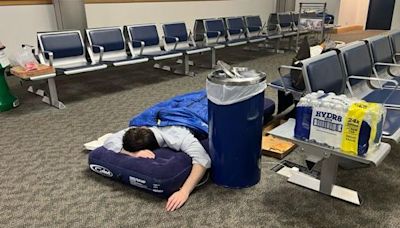 Cancelled flight sees passengers sleep in terminal