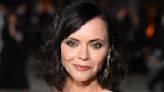 Christina Ricci Is Showing Off Her Wild Side in This Daring V-Neck Lace & Leopard Print Dress