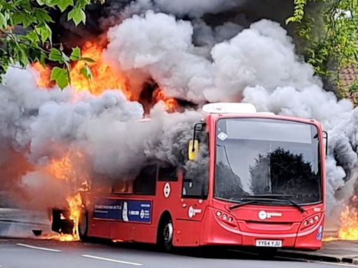 Passengers flee London bus moments before it bursts into flames on busy Twickenham road