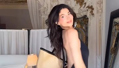 Kylie Jenner showcases her bare back in plunging black capri catsuit