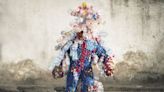 Congolese artists wear costumes made of trash to shine a light on Kinshasa’s pollution problem