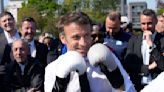France's president pounds a punching bag on camera, and Europe notices