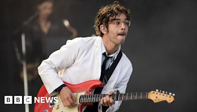 Matty Healy: The 1975 sued over festival act with same-sex kiss