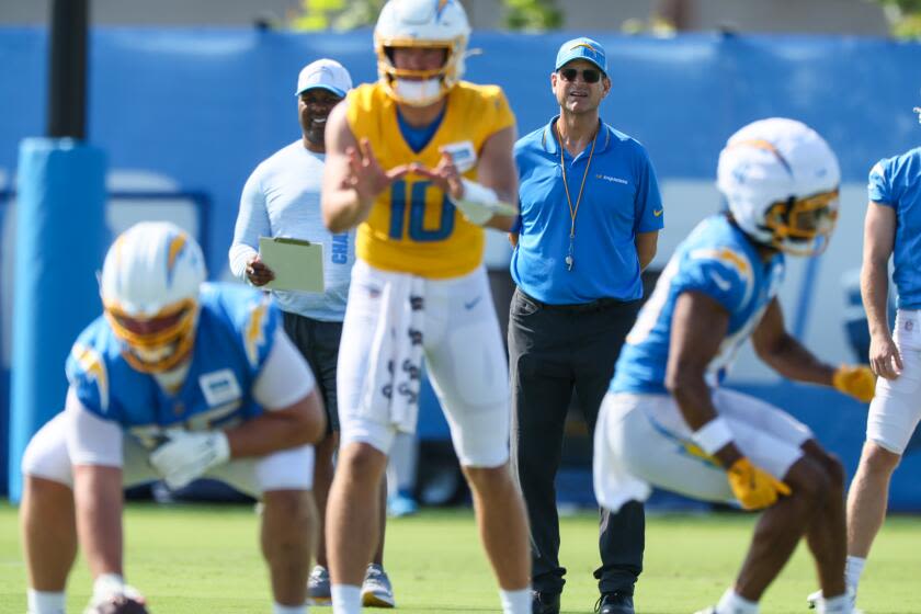 Column: Jim Harbaugh's Chargers camp debut is wacky, wonderful and like a rebirth