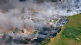 London weather latest LIVE: Major incident declared as fires surge as new record UK temperature recorded