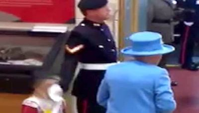 Little girl meeting Queen Elizabeth II gets smacked by saluting soldier