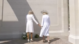 Brigitte Macron tries to hold Queen’s hand at D-Day memorial