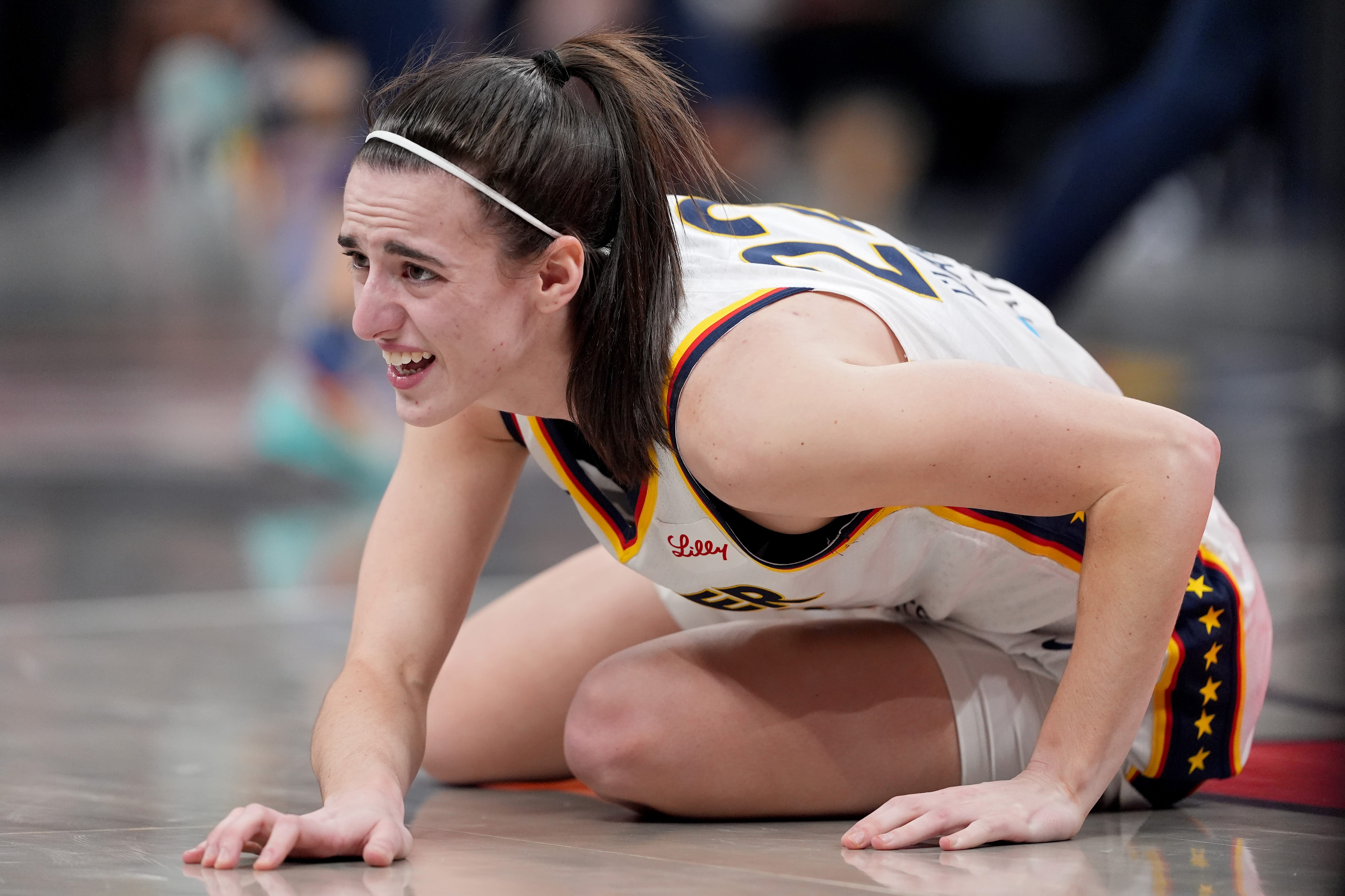 Indiana Fever's Caitlin Clark injures ankle, but returns in loss Connecticut Sun