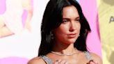 Dua Lipa Wears Just A Sparkly Thong Under Sheer Chain Mail Dress At 'Barbie' Premiere
