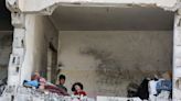Israeli forces kill dozens of Palestinians in Gaza strikes, battle Hamas in Rafah