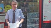 Postmaster honoured after 50 years in the job