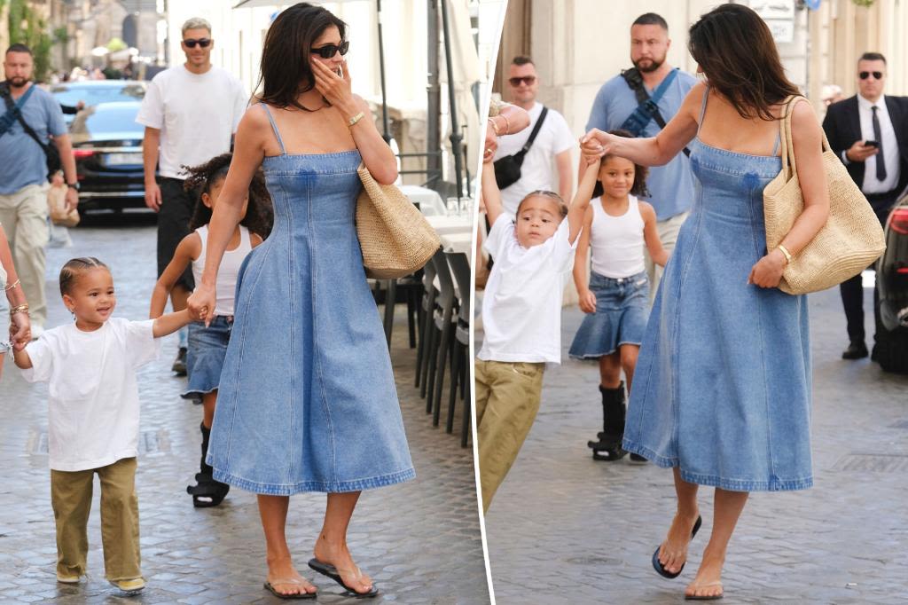 Kylie Jenner has chic mom moment in denim dress on Italy vacation with Stormi and Aire