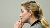 Amber Heard's supporters endure insults, mockery