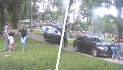 Terrifying moment carjackers open fire at family while trying to steal car with children inside
