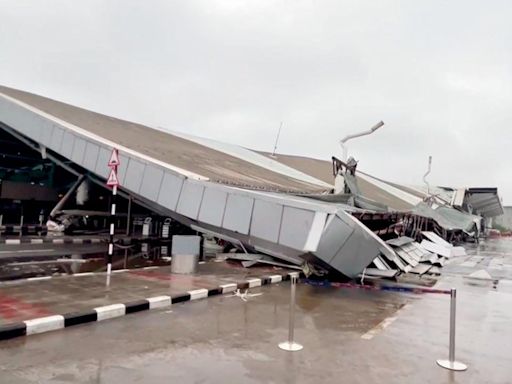 Heavy rain brings Delhi airport roof crashing