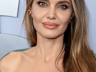 Angelina Jolie Debuts New Chest Tattoo at 2024 Tonys: Inside The Sweet Meaning