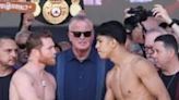 Saul Alvarez and challenger Jaime Munguia shake hands at the weigh-in for their all-Mexican super middleweight world title bout in Las Vegas