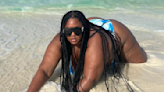 Lizzo rocks blue tie-dyed bikini in the 'middle of the ocean'