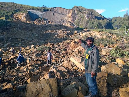 Papua New Guinea says 2,000 people buried alive in landslide as hope fades for survivors