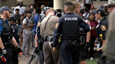 UT Austin administration confiscate weapons from protestors