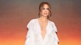 Jennifer Lopez Wears Elegant Ruffled White Cape at Atlas Premiere