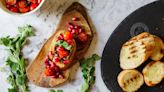 Top Cheese Crostini With Pomegranate Seeds For A Sweet Twist