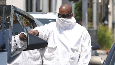 Kanye West shields his face during incognito outing in Beverly Hills