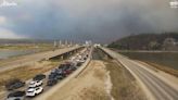 Fear, anxiety as thousands flee their homes in Fort McMurray due to threat of wildfire