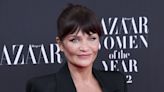 Helena Christensen Wore a Winter White Dress & Lacy Black Bra To Spread Much-Needed Holiday Cheer