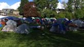 Hundreds of asylum seekers in encampment at Seattle park after funding for hotel stay runs out