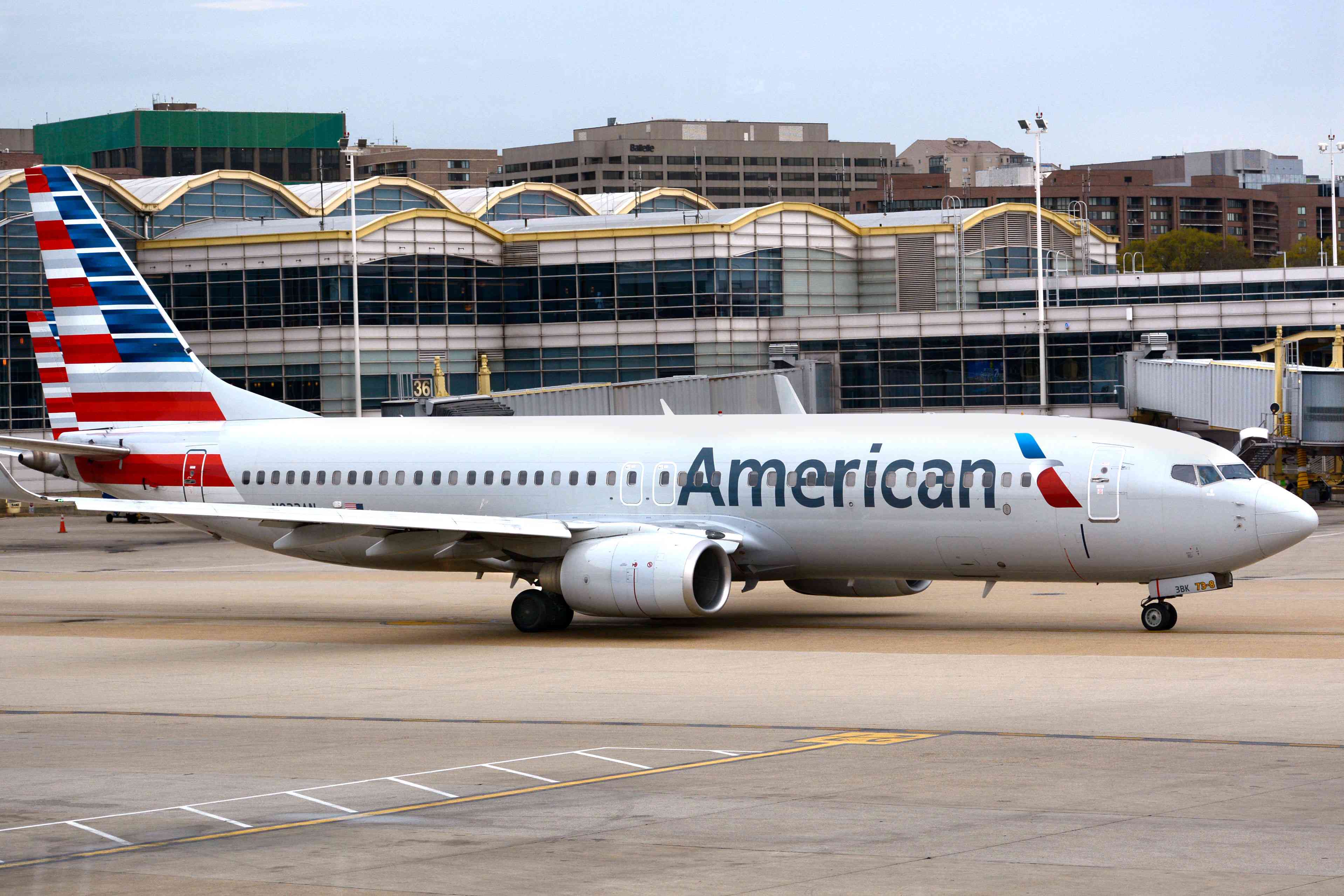 American Airlines Passengers Defy Orders to Leave Belongings and Move During Chaotic Plane Evacuation: WATCH