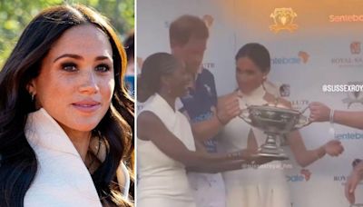 ...Markle Labeled 'Bossy and Insecure' After Awkwardly Refusing to Let a Woman Pose With Prince Harry at Charity Polo Match