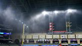 Water pours through Minute Maid Park's roof but the game goes on