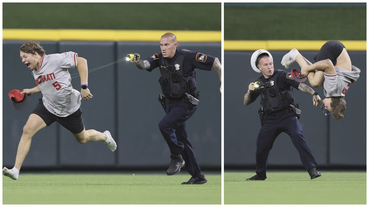 Dramatic Photos Show Moment Officer Tased Reds Fan Who Did Backflip on Field