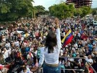 Banned from traveling by plane, Maria Corina Machado has been crisscrossing the country by car to urge Venezuelans to vote for little-known diplomat Edmundo Gonzalez Urrutia