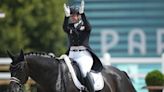 Equestrian star Werth urges better horse welfare but bristles at questions over a suspended rider