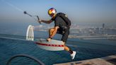 Wakeskater and BASE Jumper Brian Grubb Pulls Off Athletic Feat From a Dubai Skyscraper Wearing Prada