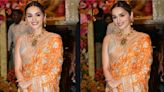 Manushi Chhillar embraces her traditional side in a stunning orange and gold bandhani saree at the pre-wedding celebrations of Anant Ambani and Radhika Merchant.