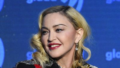 Fans sue Madonna over late appearance, hot arena in DC