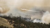 Northern California wildfire does not grow but winds and hot weather could whip up flames